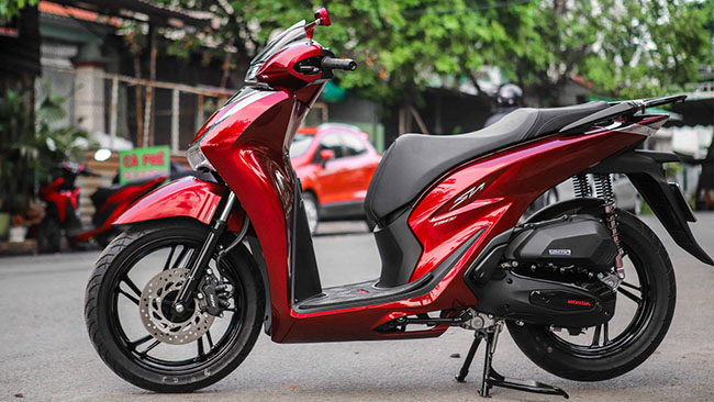 Sơn xe máy SH màu đỏ tươi phối đen bóng hút mắt ở Hà Nội